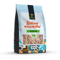 Bag of organic rolled oats with blue and patterned geometric design, front label in Ukrainian.