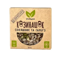 Front of kraft paper seed box with a window showing pumpkin and sunflower seeds; 50 g, vegan and raw product.