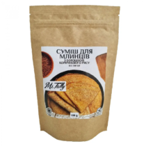 Brown paper pouch containing gluten-free pancake mix with label showing pancakes and the brand Ms. Tally, 150 g.
