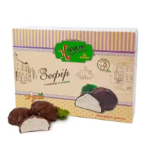 Box of Ukrainian chocolate-covered zephyr with stevia, showing two pieces in front and one halved to reveal white marshmallow center