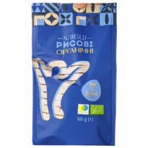Blue package of organic rice bread/crackers with a stylized figure and multiple certification logos on the front