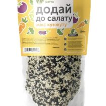 Package of sesame seed mix for salad in a yellow pouch with Cyrillic label 'додай до салату мікс кунжуту'; sesame seeds visible through the transparent lower half.