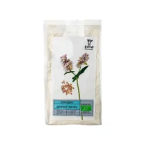 Bag of organic buckwheat flour with a white label featuring a buckwheat plant illustration and a small pile of groats.