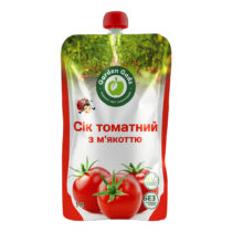 pouch of tomato juice with pulp, red and white packaging showing fresh tomatoes at the bottom and a green garden logo on top (ukrainian label: 'Сік томатний з м'якоттю') інтернет-магазин молочних і натуральних продуктів